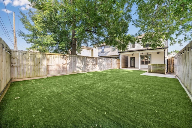 831 W 26th St, Houston, TX 77008 - fenced backyard featuring a patio