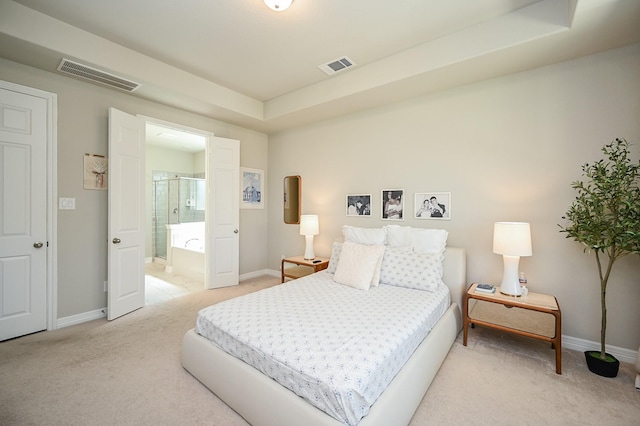 24311 Orley Island Ct, Katy, TX 77493 - bedroom with light colored carpet and connected bathroom