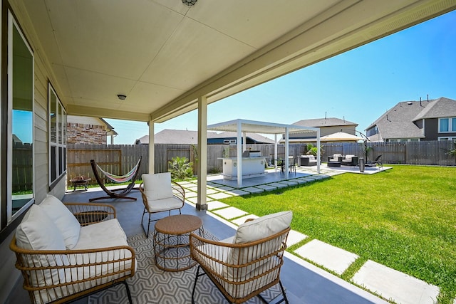 24311 Orley Island Ct, Katy, TX 77493 - fenced backyard with an outdoor living space and a patio area