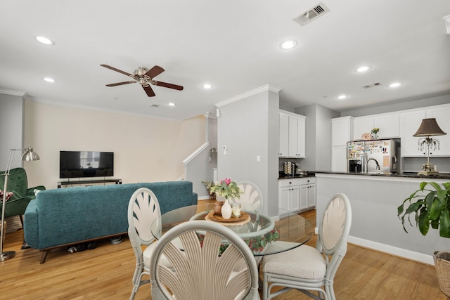 3001 Murworth Dr Unit 1606, Houston, TX 77025 - dining room with ornamental molding, ceiling fan, light wood finished floors, and recessed lighting