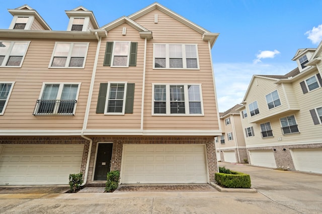3001 Murworth Dr Unit 1606, Houston, TX 77025 - view of front facade with brick siding and a garage