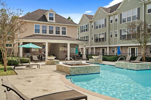 3001 Murworth Dr Unit 1606, Houston, TX 77025 - community pool with a patio area and a hot tub
