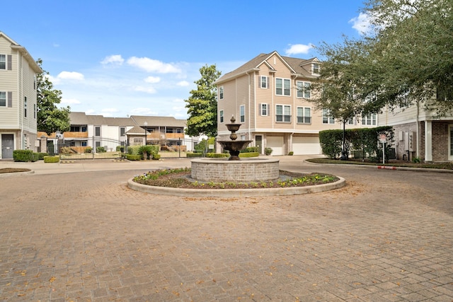 3001 Murworth Dr Unit 1606, Houston, TX 77025 - view of home's community featuring curved driveway, a garage, and a residential view