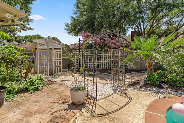 7943 Scenic Canyon Ln, Houston, TX 77095 - fenced backyard with a patio and a pergola