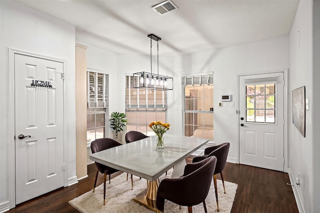 7943 Scenic Canyon Ln, Houston, TX 77095 - dining area featuring dark wood-type flooring and a chandelier