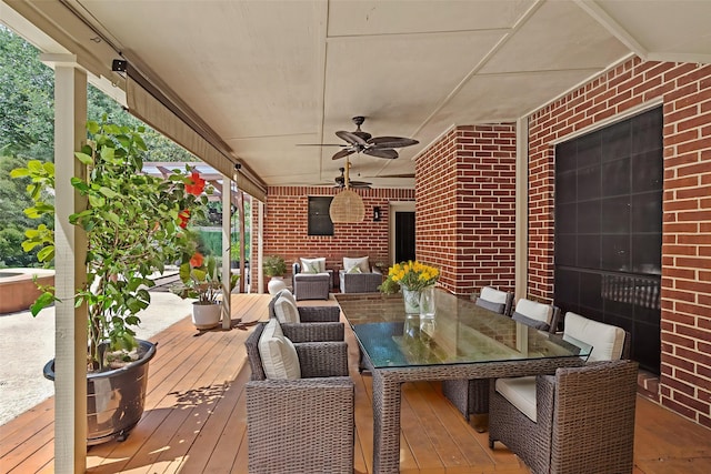 7943 Scenic Canyon Ln, Houston, TX 77095 - wooden terrace with ceiling fan and outdoor dining area