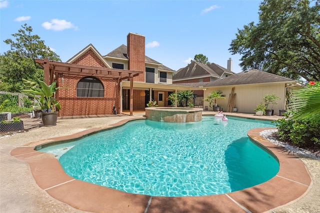 7943 Scenic Canyon Ln, Houston, TX 77095 - view of swimming pool with a pool with connected hot tub, a patio area, and a pergola