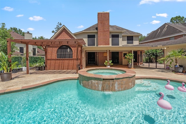 7943 Scenic Canyon Ln, Houston, TX 77095 - view of swimming pool featuring a pool with connected hot tub and a patio area
