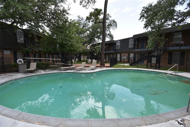 9007 Gaylord St Unit 23, Houston, TX 77024 - community pool featuring stairs