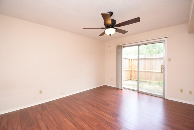 9007 Gaylord St Unit 23, Houston, TX 77024 - unfurnished room featuring dark wood-type flooring and a ceiling fan