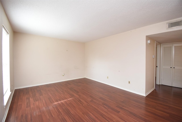 9007 Gaylord St Unit 23, Houston, TX 77024 - unfurnished room with wood finished floors and baseboards