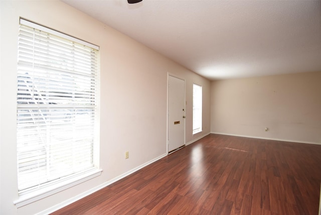 9007 Gaylord St Unit 23, Houston, TX 77024 - spare room with wood finished floors and baseboards