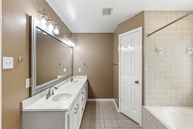 110 Rustling Wind Dr, Montgomery, TX 77356 - bathroom featuring tiled bath, double vanity, tile patterned floors, and a tile shower