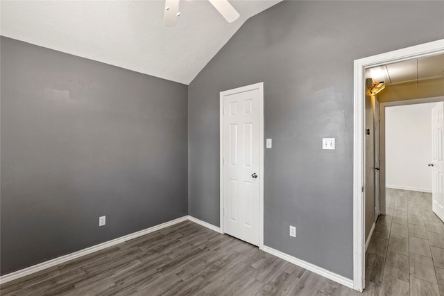 110 Rustling Wind Dr, Montgomery, TX 77356 - unfurnished room with attic access, wood finished floors, a ceiling fan, and lofted ceiling