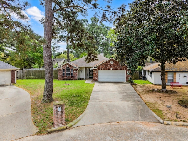 110 Rustling Wind Dr, Montgomery, TX 77356 - view of front of home with driveway, an attached garage, and brick siding