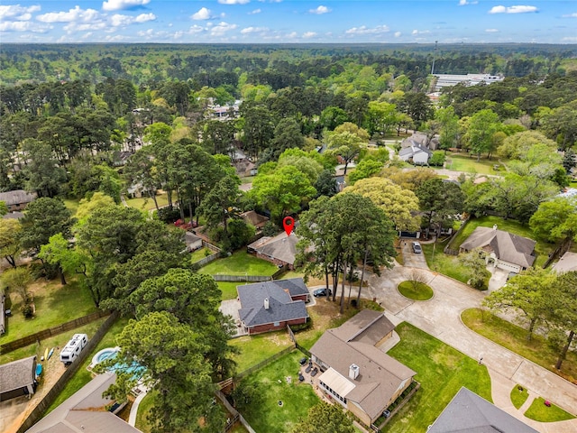 110 Rustling Wind Dr, Montgomery, TX 77356 - aerial view of property and surrounding area featuring a forest and nearby suburban area