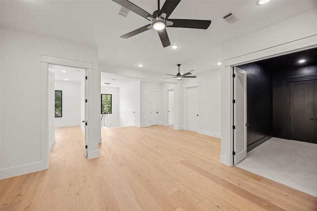 431 W 30th St, Houston, TX 77018 - unfurnished living room with ceiling fan, recessed lighting, and light wood-type flooring