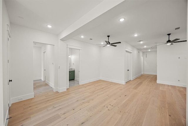 431 W 30th St, Houston, TX 77018 - unfurnished living room featuring a ceiling fan, attic access, light wood-style floors, and recessed lighting