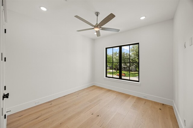431 W 30th St, Houston, TX 77018 - spare room with light wood finished floors, a ceiling fan, and recessed lighting