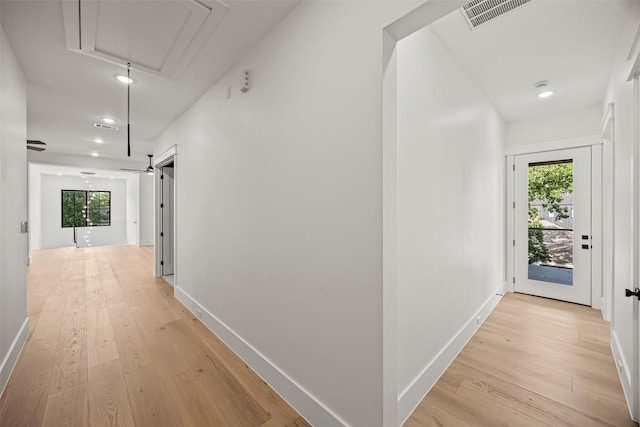 431 W 30th St, Houston, TX 77018 - hallway featuring attic access, light wood-style flooring, healthy amount of natural light, and recessed lighting
