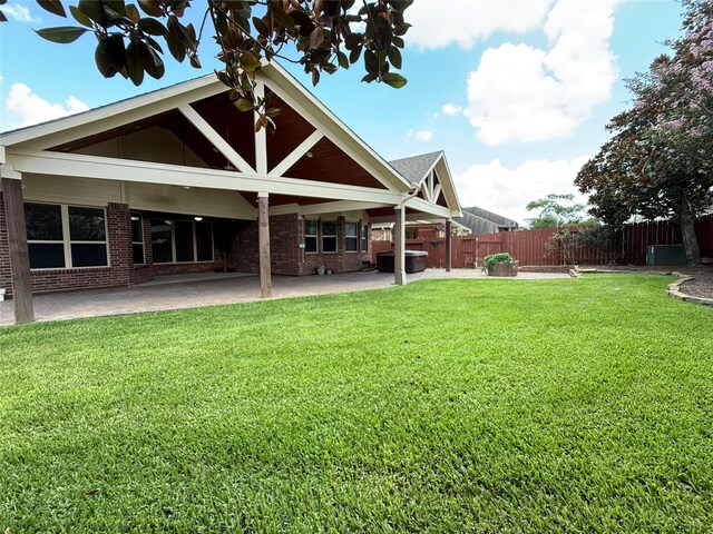 4327 Estes Ridge Ln, Katy, TX 77493 - back of property with a patio and brick siding