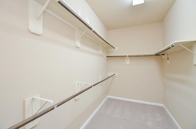 4327 Estes Ridge Ln, Katy, TX 77493 - walk in closet with carpet flooring