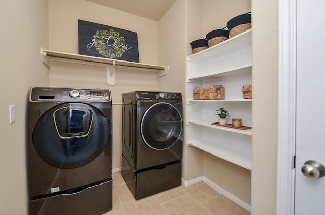 4327 Estes Ridge Ln, Katy, TX 77493 - washroom with washing machine and dryer and light tile patterned flooring