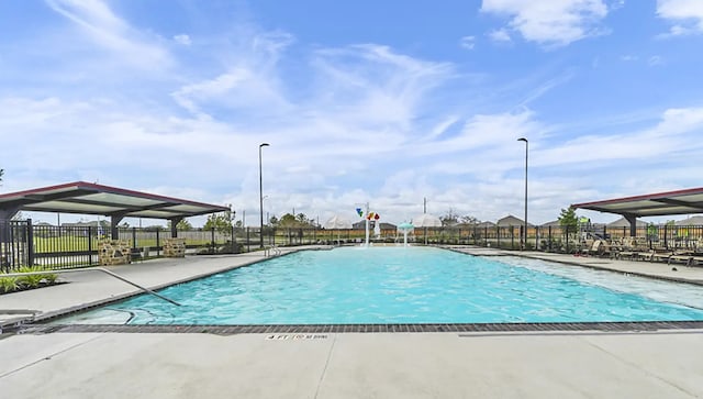 4327 Estes Ridge Ln, Katy, TX 77493 - community pool featuring a patio area