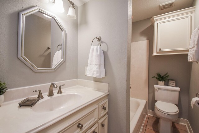 9005 Gaylord St Unit 19, Houston, TX 77024 - bathroom with vanity, tile patterned floors, and shower / washtub combination