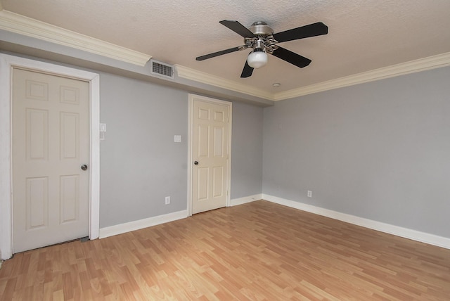 9005 Gaylord St Unit 19, Houston, TX 77024 - unfurnished room featuring light wood finished floors, crown molding, ceiling fan, and a textured ceiling