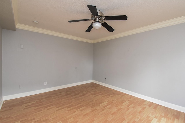 9005 Gaylord St Unit 19, Houston, TX 77024 - empty room featuring light wood finished floors, a ceiling fan, ornamental molding, and a textured ceiling