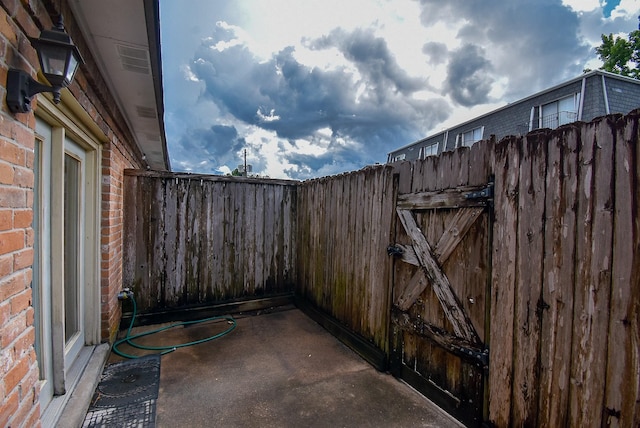 9005 Gaylord St Unit 19, Houston, TX 77024 - view of patio / terrace with a gate