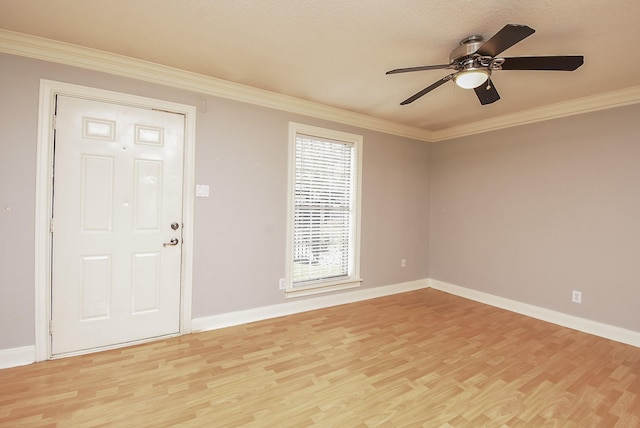 9005 Gaylord St Unit 19, Houston, TX 77024 - entrance foyer with light wood finished floors, ornamental molding, and ceiling fan
