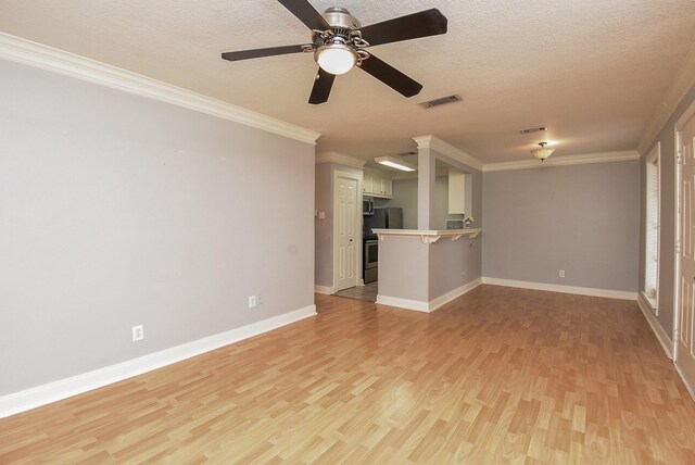 9005 Gaylord St Unit 19, Houston, TX 77024 - unfurnished living room with light wood finished floors, ceiling fan, a textured ceiling, and crown molding