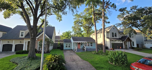 1646 Du Barry Ln, Houston, TX 77018 - view of front of property with a front lawn, board and batten siding, driveway, and a residential view