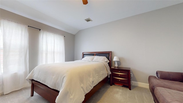 1309 Bayswater Dr, Houston, TX 77047 - bedroom with light colored carpet, vaulted ceiling, and a ceiling fan