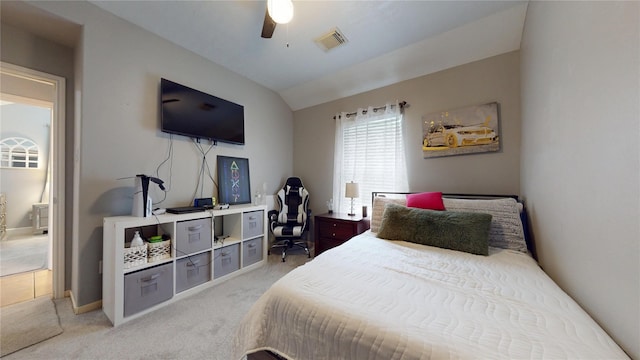 1309 Bayswater Dr, Houston, TX 77047 - bedroom featuring light colored carpet, an office area, a ceiling fan, and vaulted ceiling