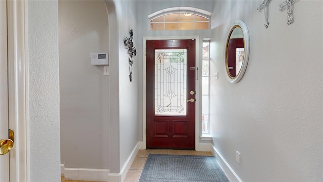 1309 Bayswater Dr, Houston, TX 77047 - entrance foyer featuring light tile patterned floors and baseboards