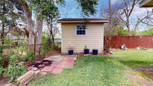 1309 Bayswater Dr, Houston, TX 77047 - view of outbuilding with a fenced backyard