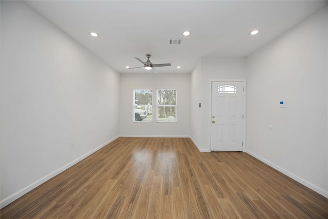 8923 De Priest St, Houston, TX 77088 - foyer featuring ceiling fan, wood finished floors, and recessed lighting