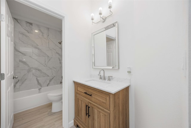 8923 De Priest St, Houston, TX 77088 - bathroom with vanity, tub / shower combination, and wood finished floors