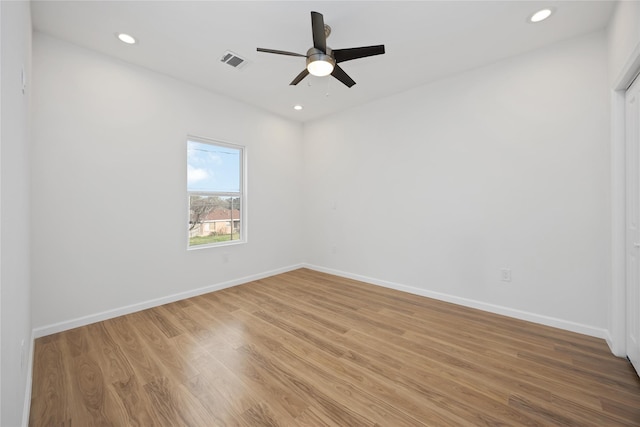 8923 De Priest St, Houston, TX 77088 - unfurnished room with light wood finished floors, a ceiling fan, and recessed lighting