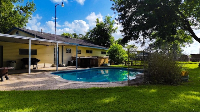 141 Cypress Dr, Richwood, TX 77531 - swimming pool with a jacuzzi, a yard, area for grilling, and a patio