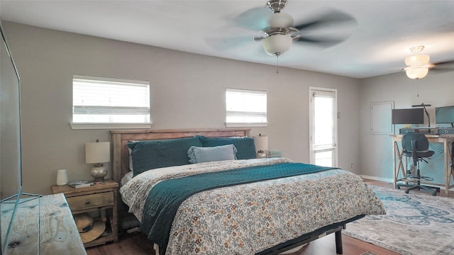 141 Cypress Dr, Richwood, TX 77531 - bedroom featuring wood finished floors and a ceiling fan