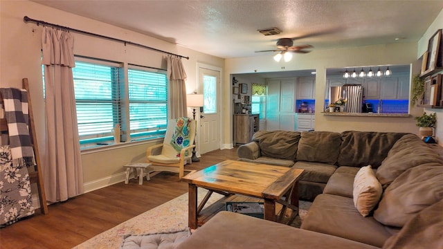 141 Cypress Dr, Richwood, TX 77531 - living room with ceiling fan, wood finished floors, and a textured ceiling