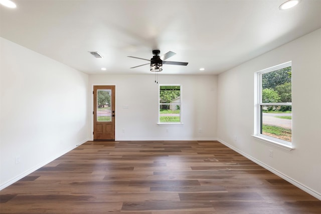 228 Cherry, Lexington, TX 78947 - empty room featuring plenty of natural light, ceiling fan, recessed lighting, and dark wood finished floors