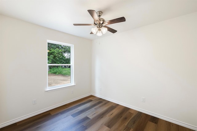 228 Cherry, Lexington, TX 78947 - spare room featuring dark wood finished floors and a ceiling fan