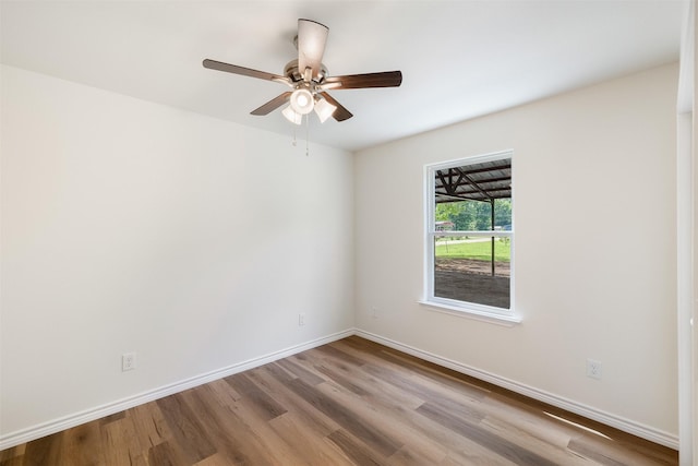 228 Cherry, Lexington, TX 78947 - unfurnished room with light wood-type flooring and ceiling fan