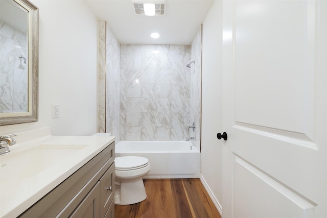 228 Cherry, Lexington, TX 78947 - bathroom with vanity, wood finished floors, and bathing tub / shower combination