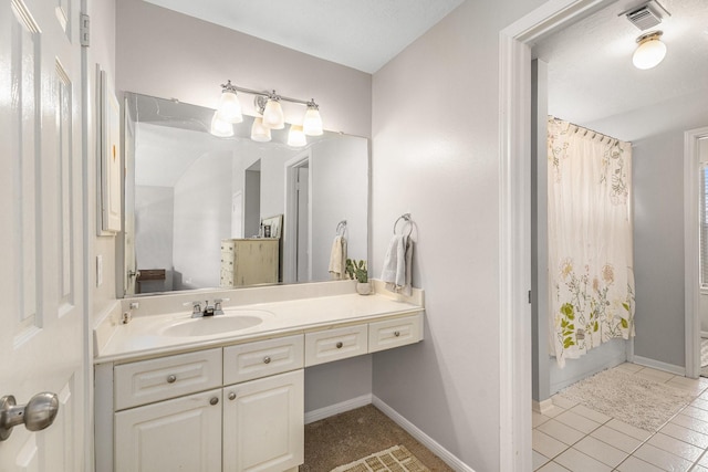 2602 Orleans Dr, Seabrook, TX 77586 - bathroom featuring vanity, tile patterned floors, and a shower with curtain